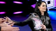 Paige ended AJ Lee's historic reign as Diva's Champion.